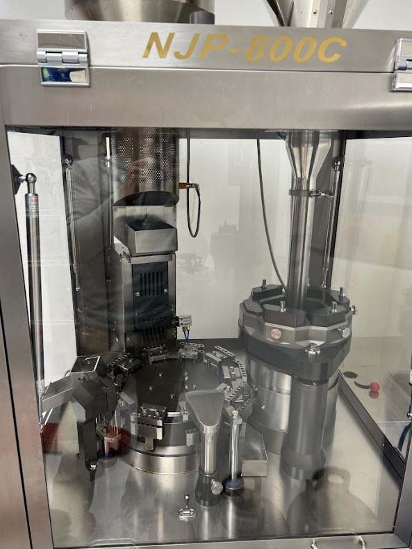 Photo Used GUANGDDONG RICH PACKING NJP-800C For Sale