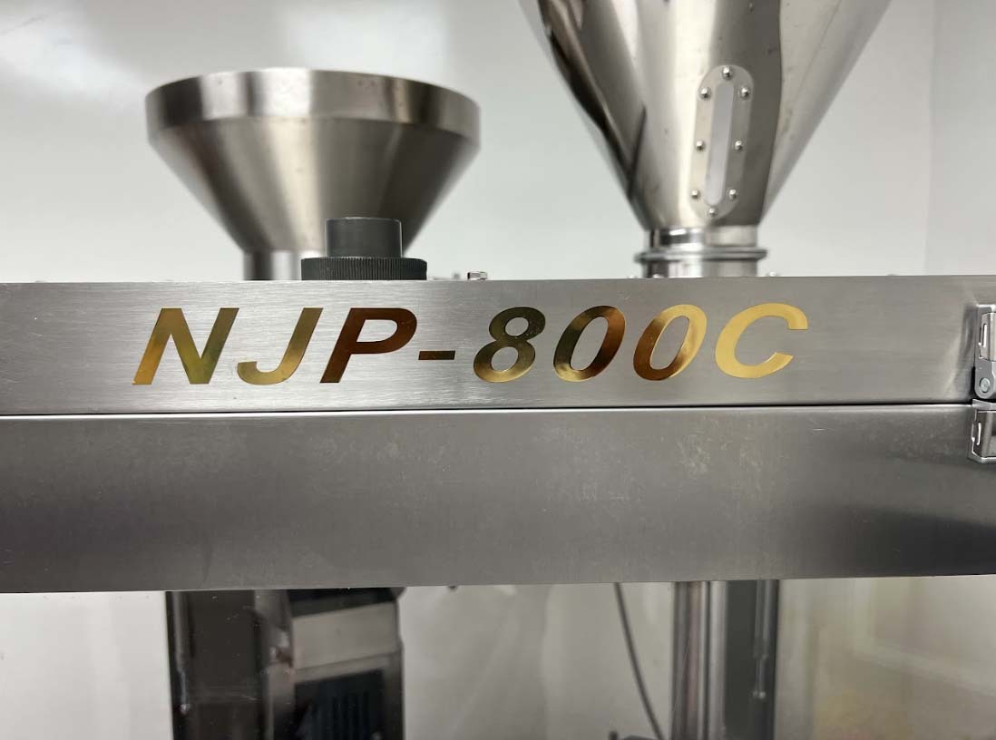 Photo Used GUANGDDONG RICH PACKING NJP-800C For Sale