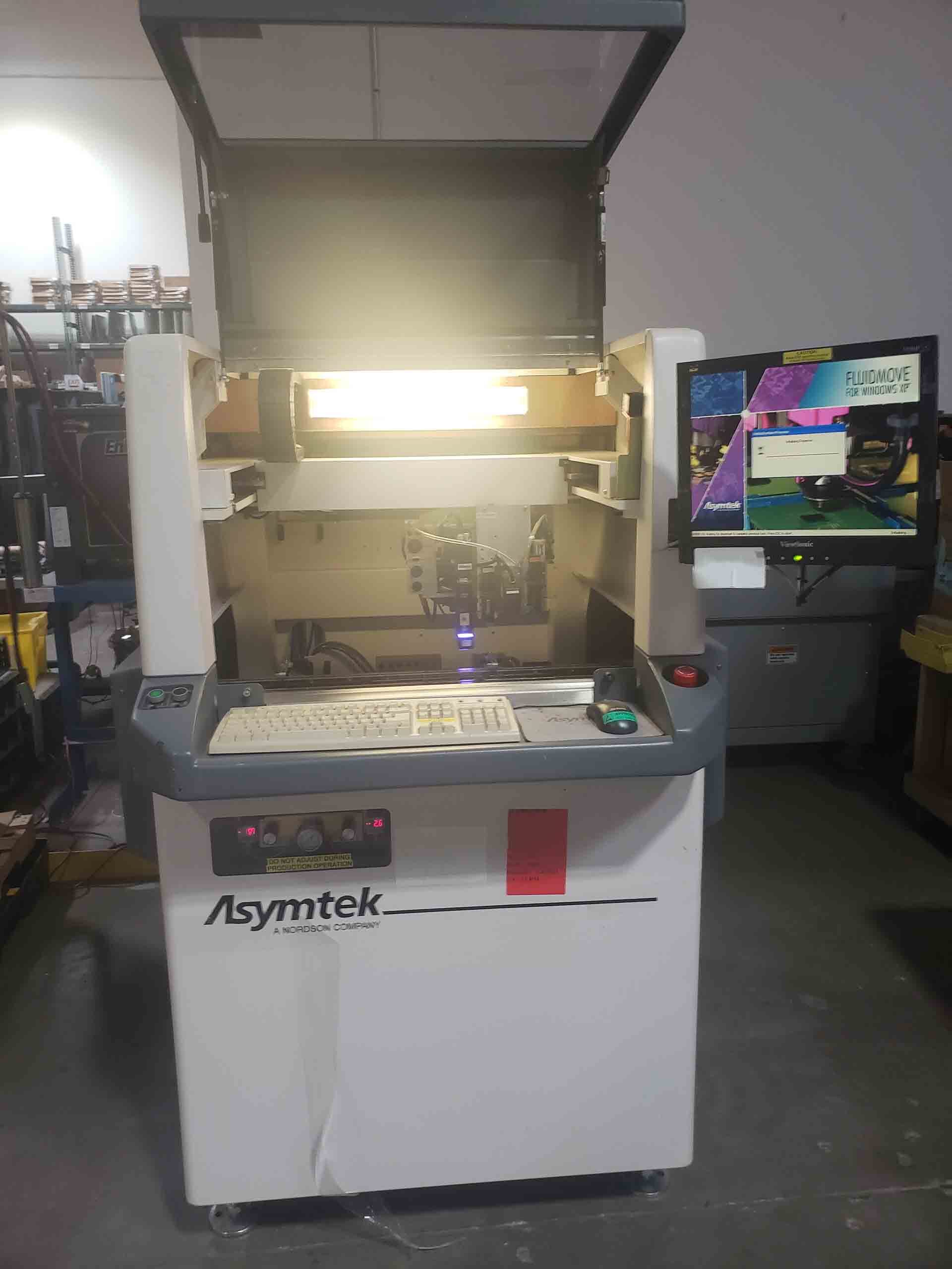 Photo Used ASYMTEK X-1010 For Sale