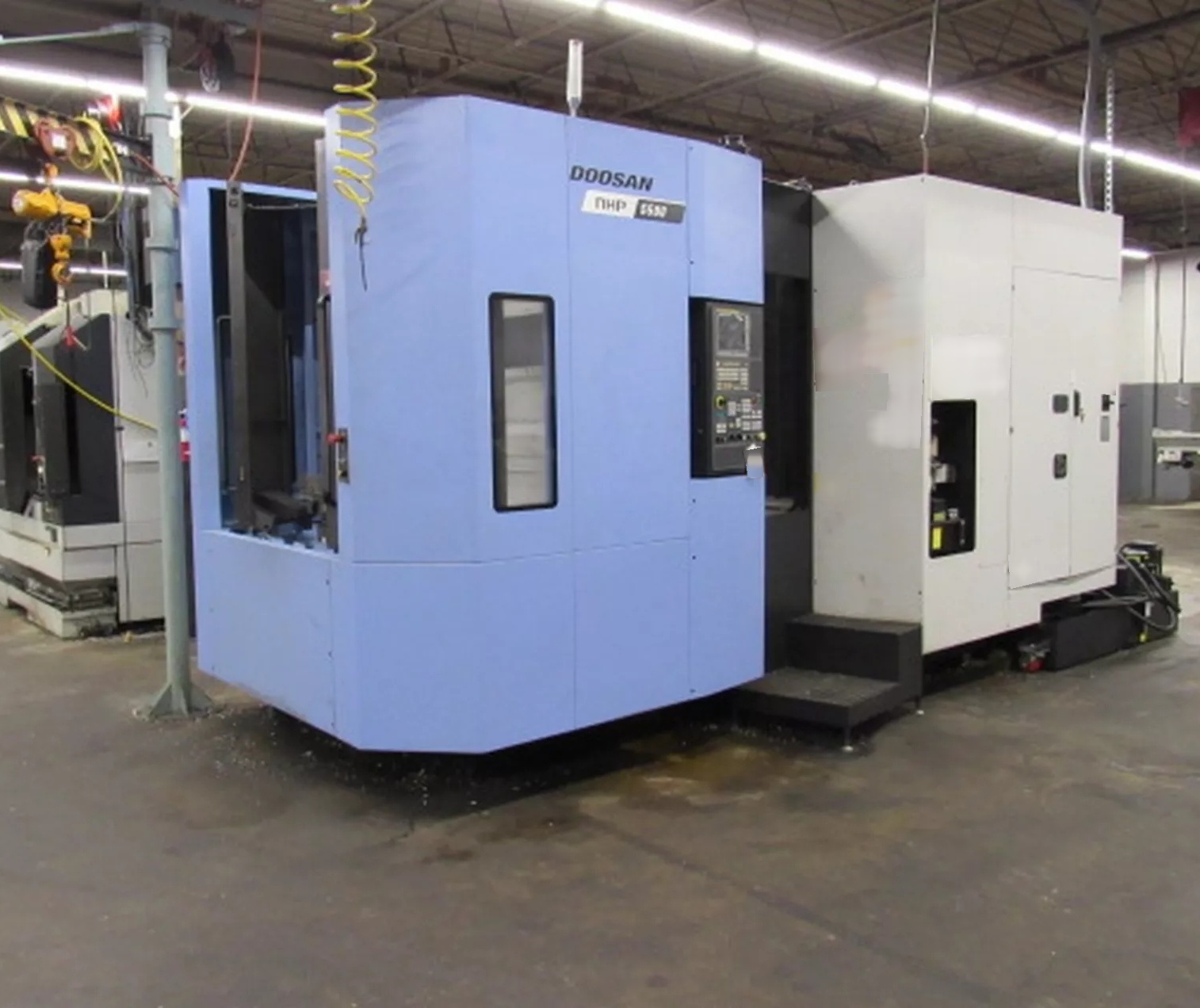 Photo Used DOOSAN NHP 5500 For Sale