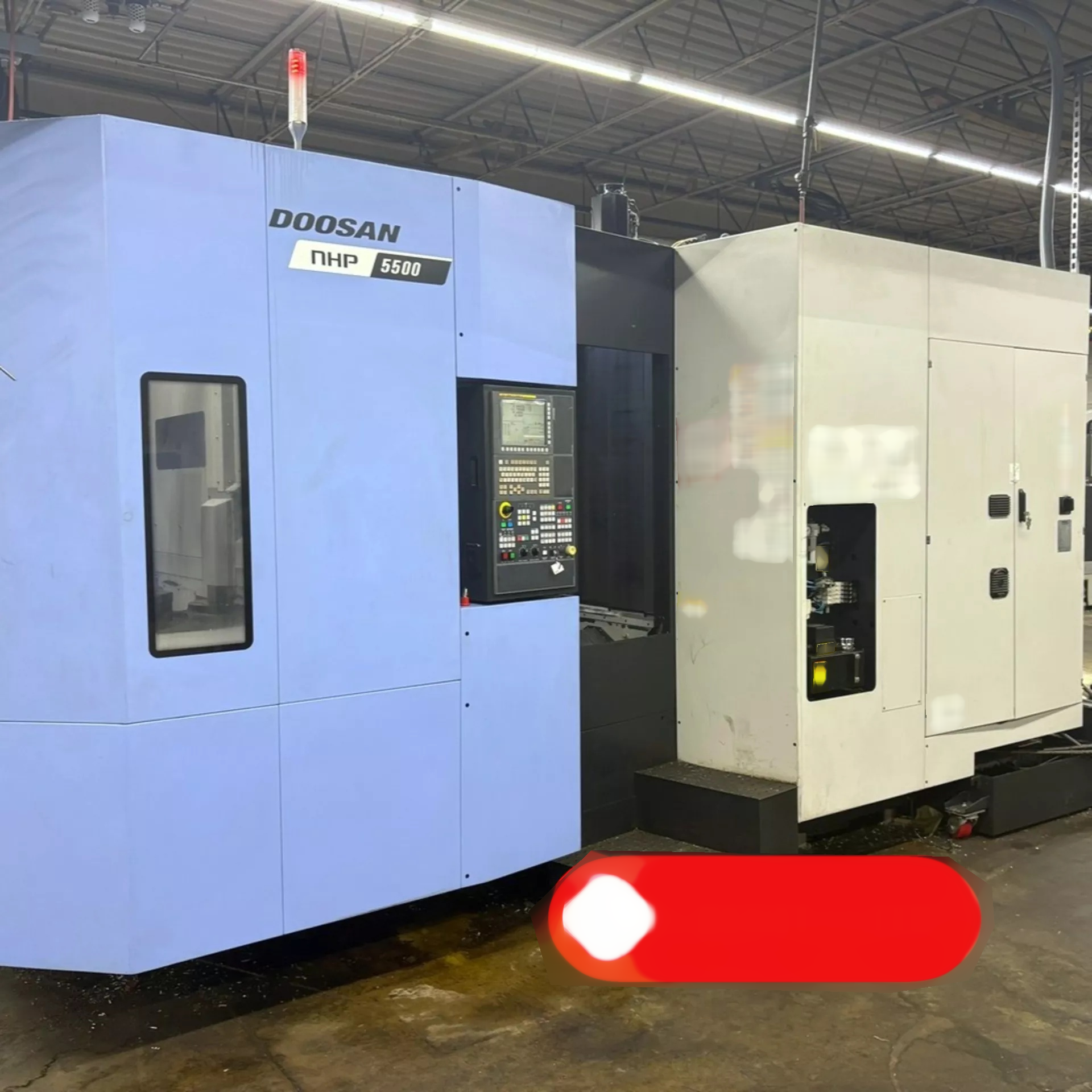 Photo Used DOOSAN NHP 5500 For Sale
