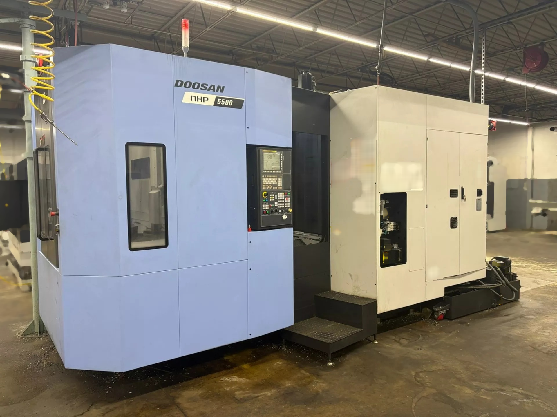 Photo Used DOOSAN NHP 5500 For Sale