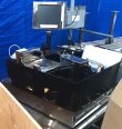 Photo Used IRVINE OPTICAL / BROOKS AUTOMATION Ultrasort 208 For Sale