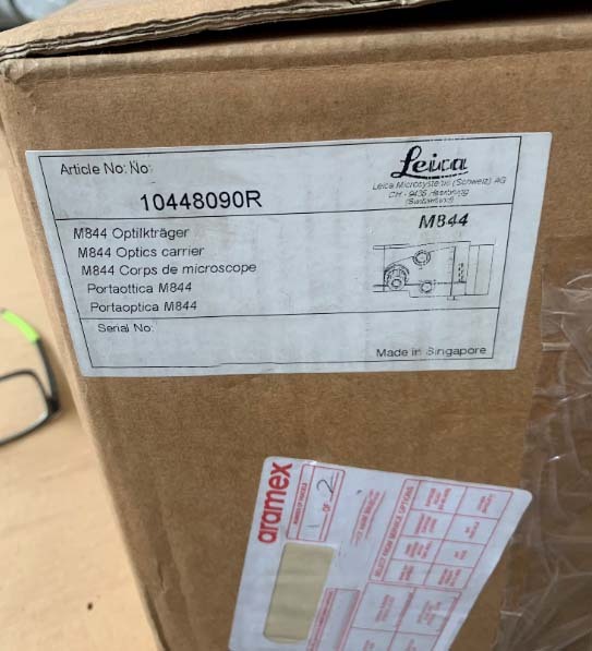 Photo Used LEICA Lot of spare parts for microscope For Sale