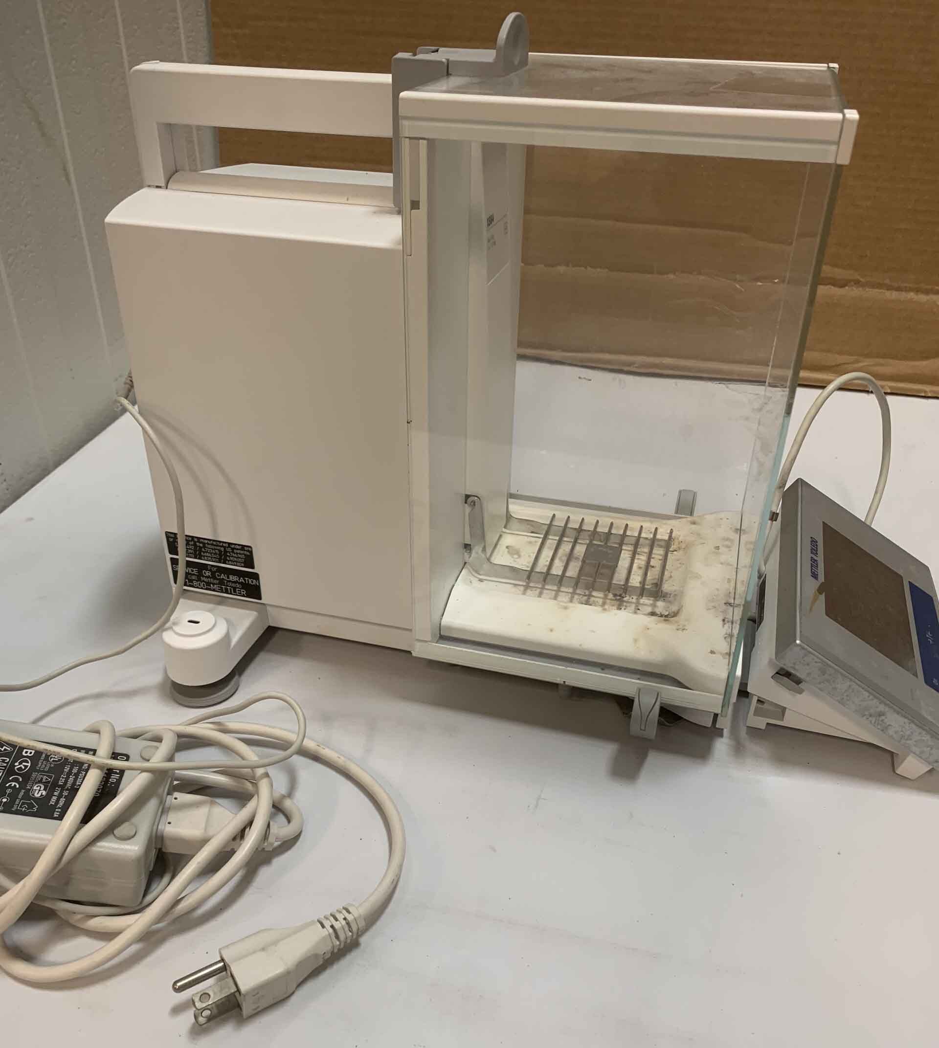 Photo Used METTLER TOLEDO XS 64 For Sale
