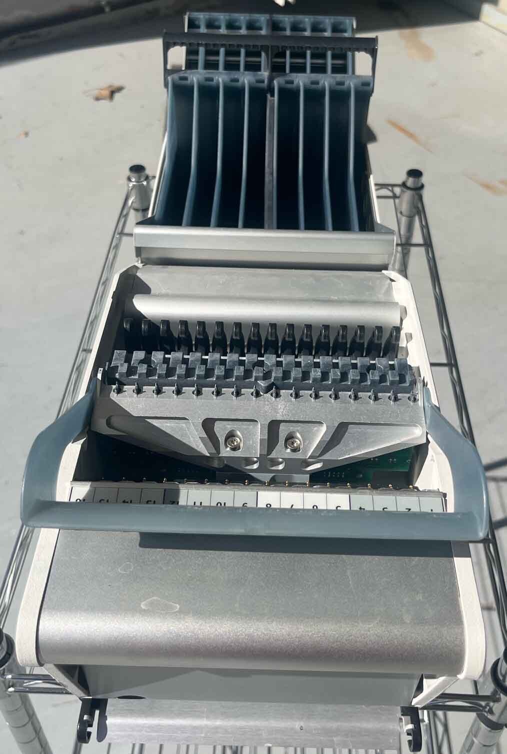 Foto Verwendet MYDATA Lot of feeders Zum Verkauf