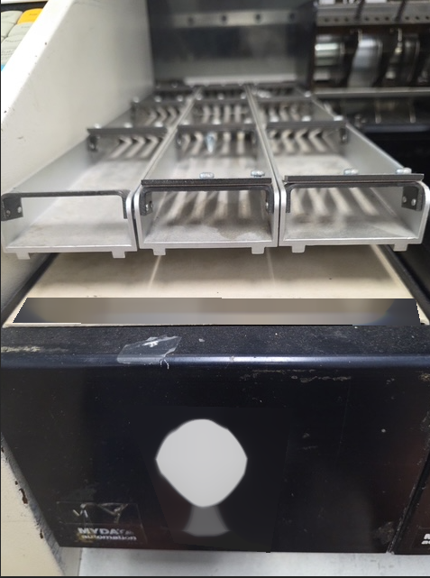 Photo Used MYDATA Lot of feeders For Sale