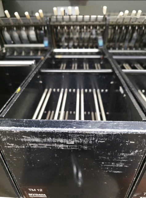 Photo Used MYDATA Lot of feeders For Sale