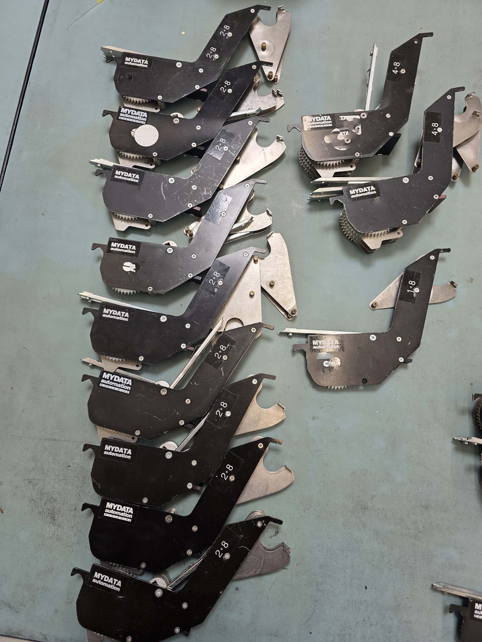 Photo Used MYDATA Lot of spare parts For Sale