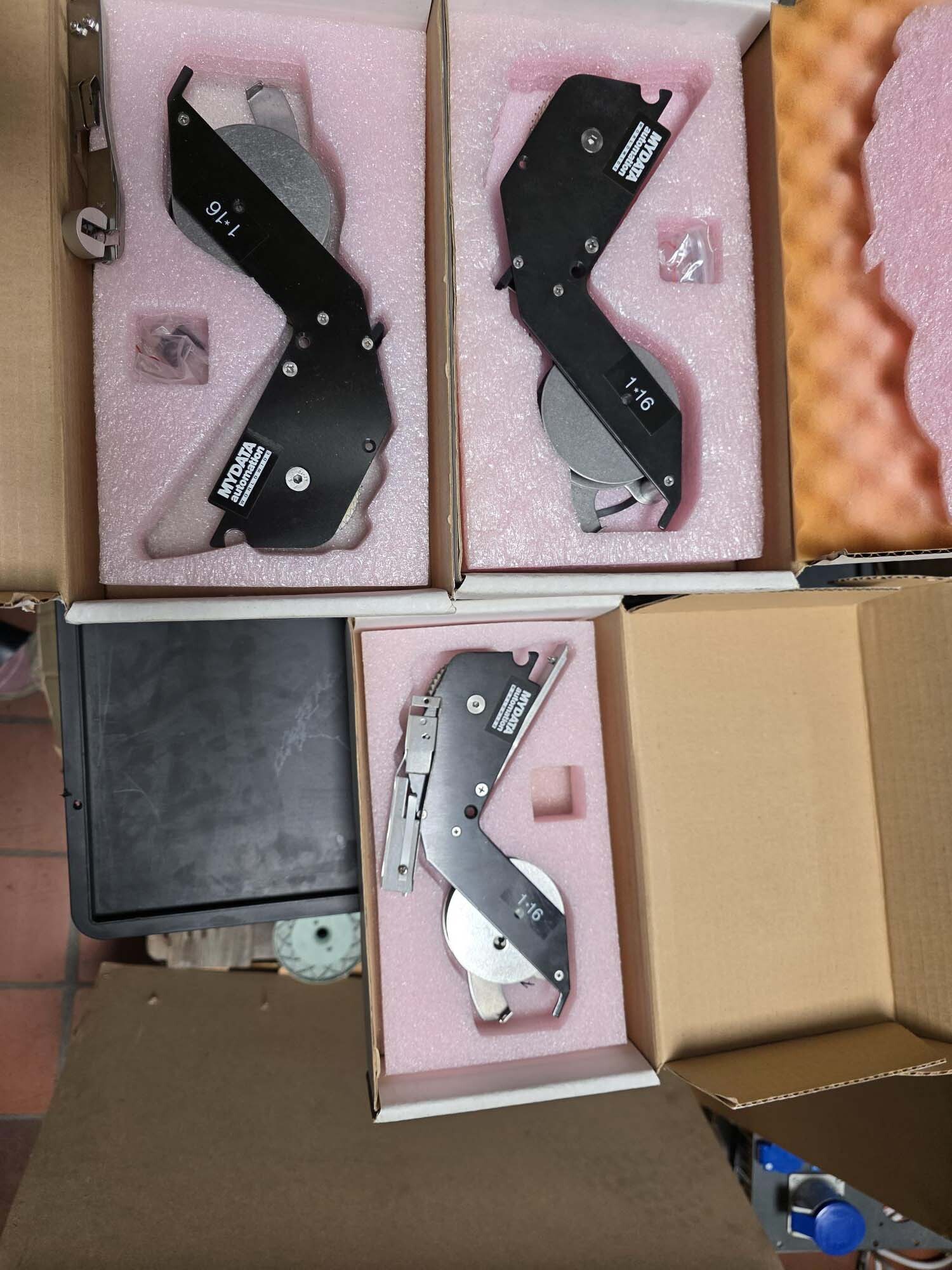 Photo Used MYDATA Lot of spare parts For Sale