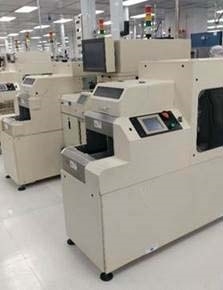 Photo Used NORDSON MARCH FlexTRAK For Sale
