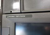 フォト（写真） 使用される OKUMA Genos M560-V 販売のために