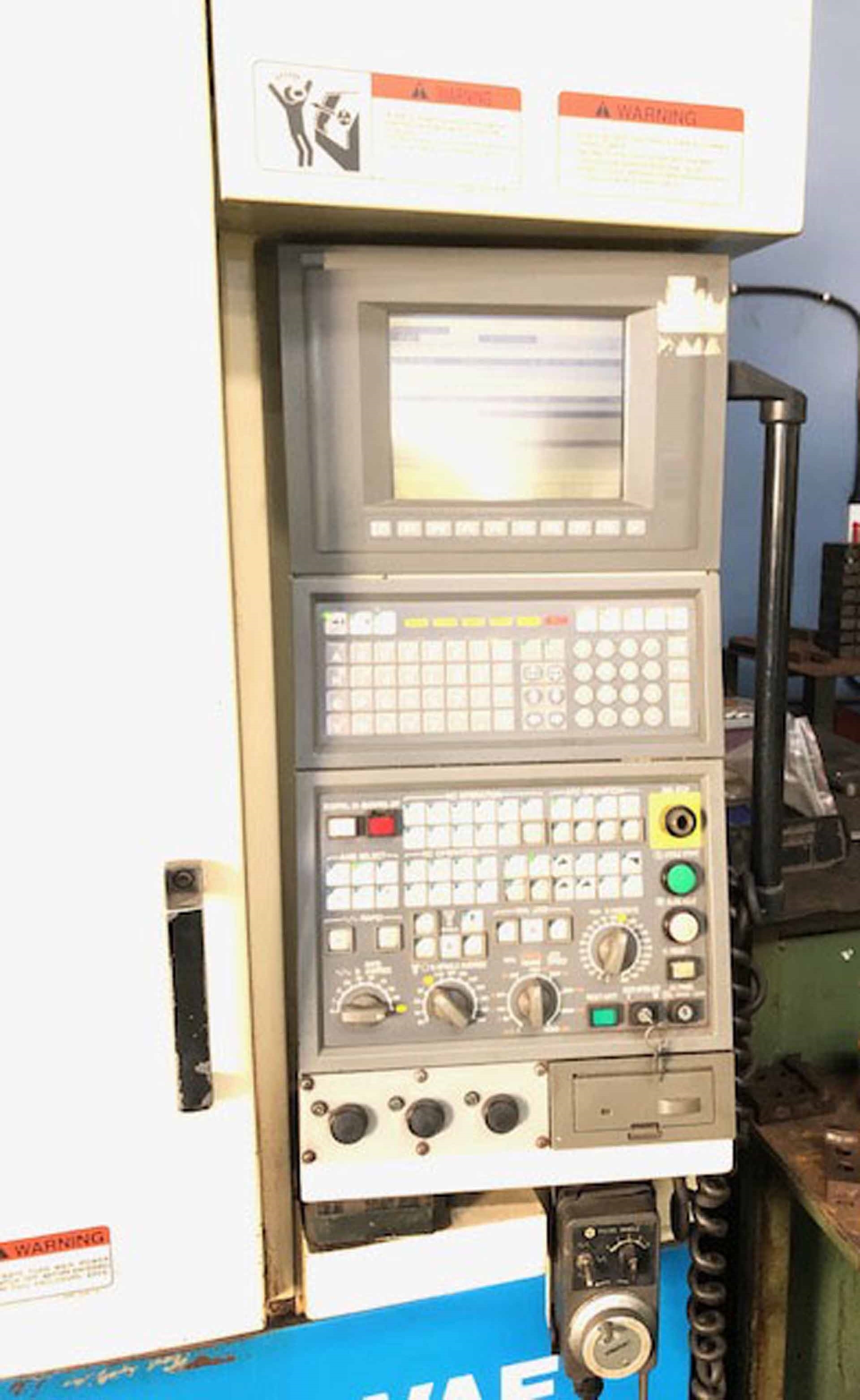 Photo Utilisé OKUMA MX-45 VAE À vendre