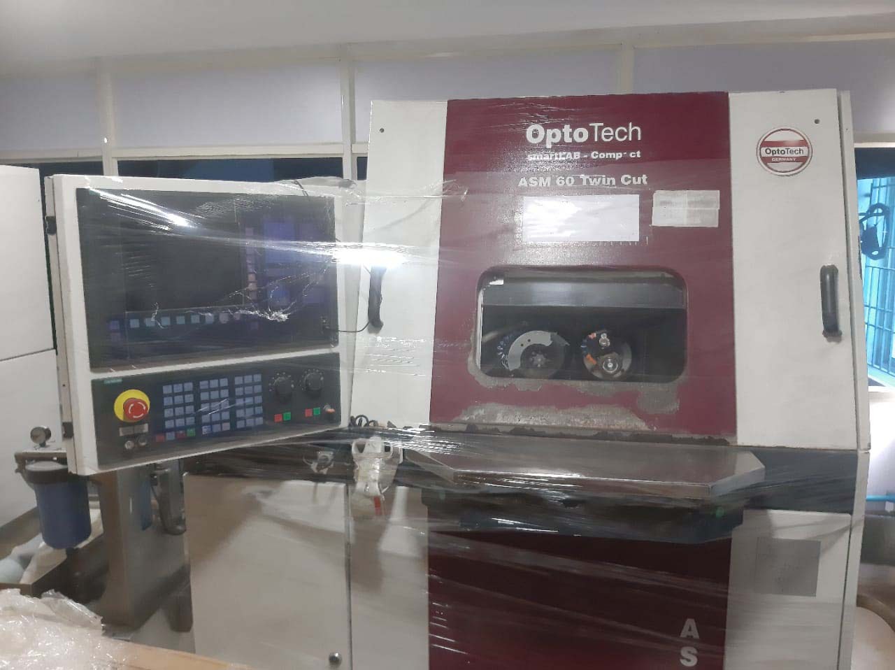 Photo Used OPTOTECH ASM 60 Twin Cut For Sale