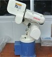 Photo Used VARIOUS Lot of robots, power pack and laser For Sale