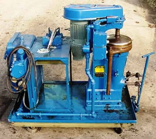Photo Utilisé SHARPLES AP-12VH À vendre