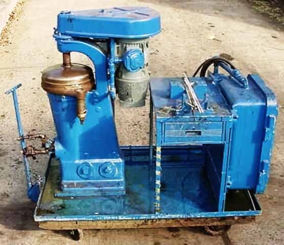 Photo Utilisé SHARPLES AP-12VH À vendre