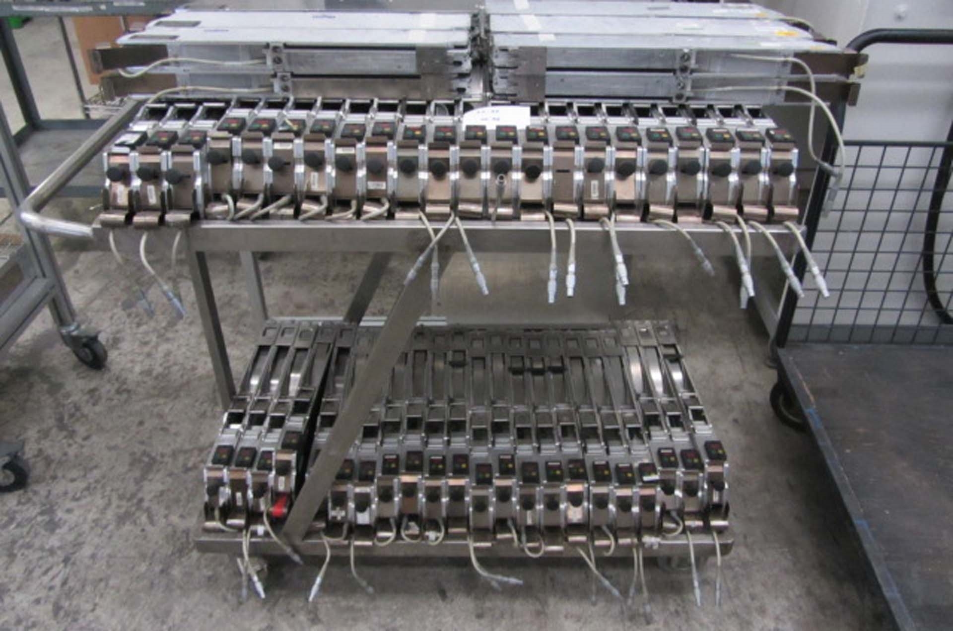 Photo Used SIEMENS Lot of feeders and trolleys For Sale