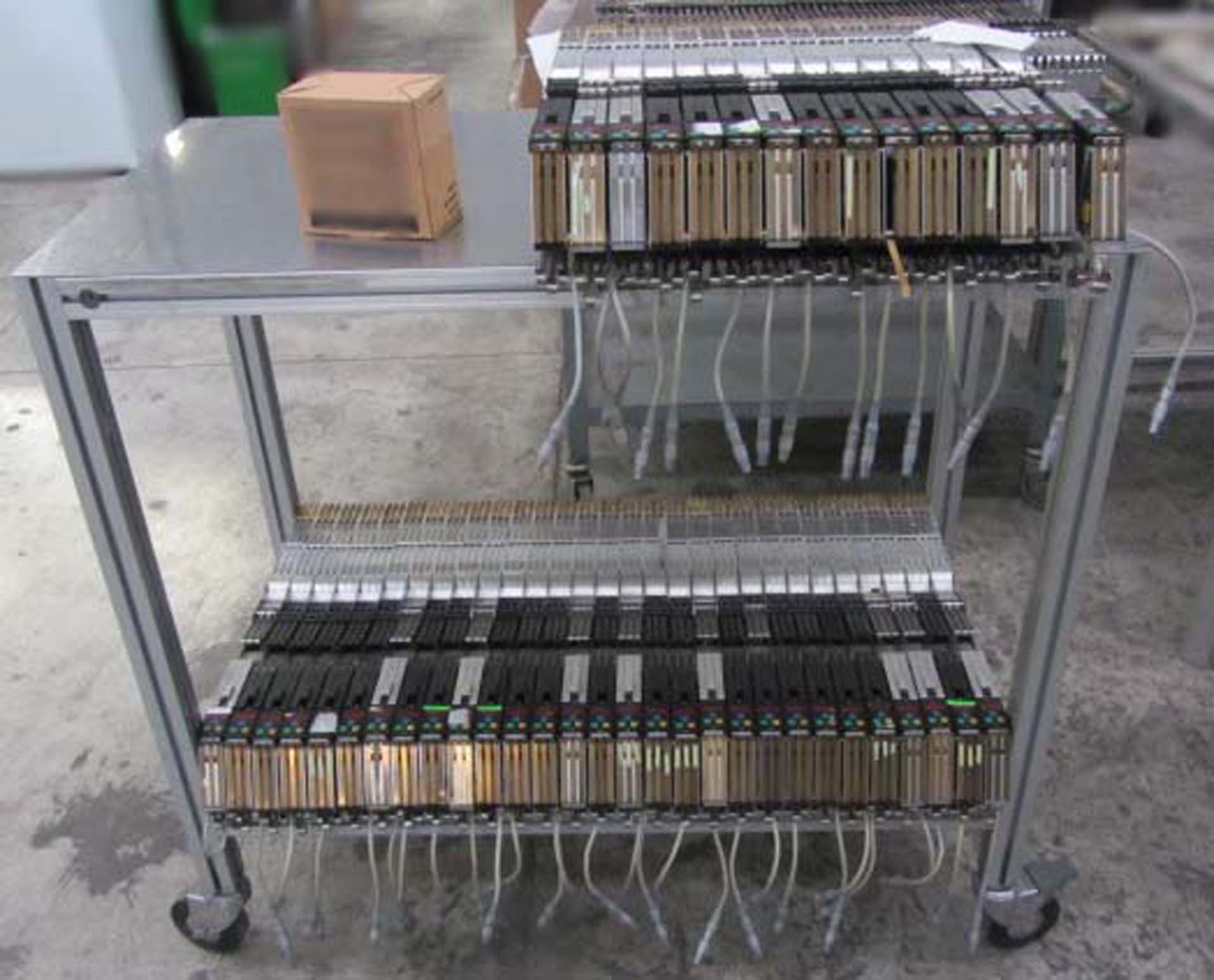 Photo Used SIEMENS Lot of feeders and trolleys For Sale