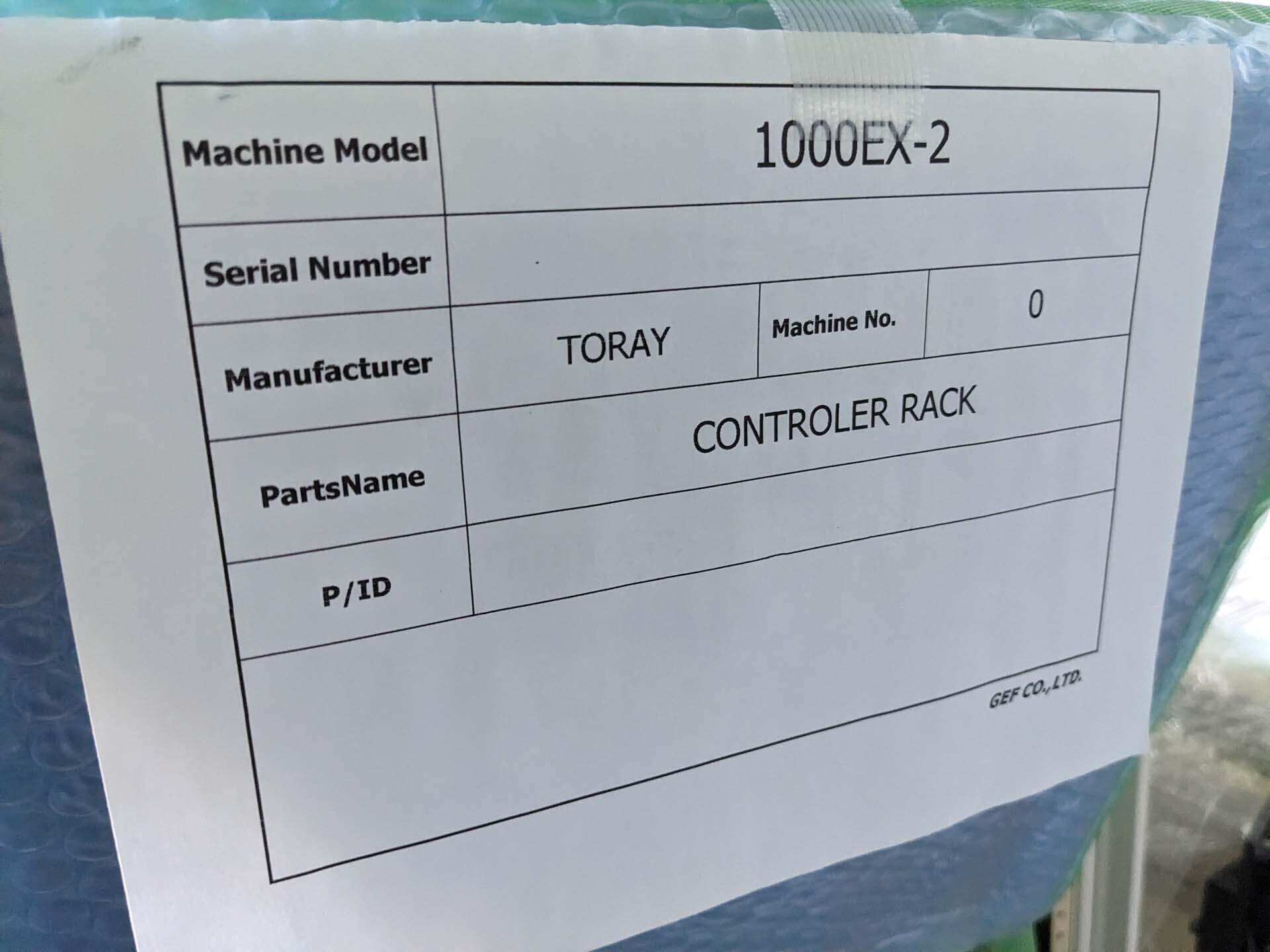 Photo Used TORAY 1000EX-2 For Sale