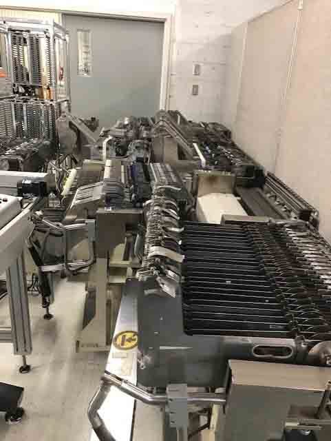 Photo Used ZEVATECH / JUKI Lot of feeders and carts for KE 2000 For Sale