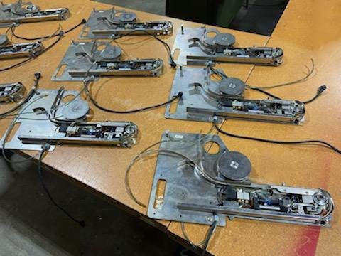 Photo Used ZEVATECH / JUKI Lot of spare parts For Sale